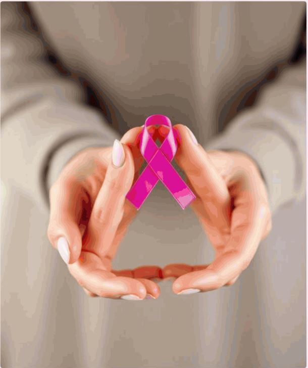 Two hands cupped together, gently holding a pink awareness ribbon